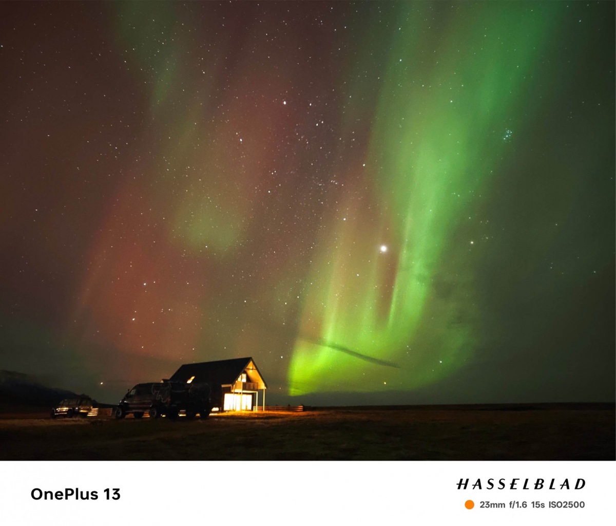 Green aurora and house OnePlus camera sample with Hasselblad footer